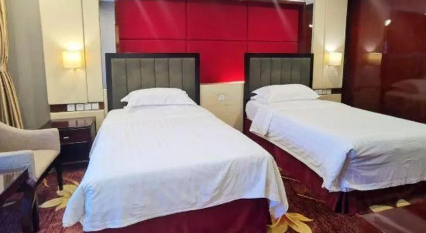 Bed in West International Trade Grand Hotel