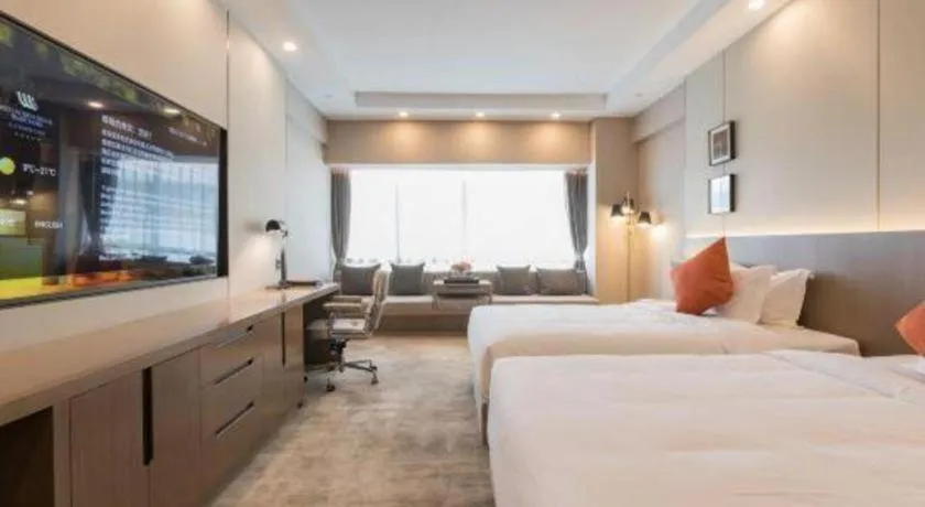 Bed in West International Trade Grand Hotel