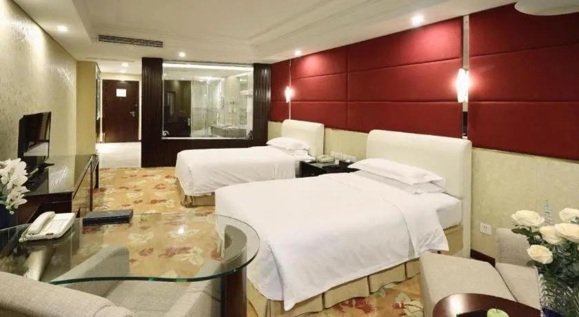 Bed in West International Trade Grand Hotel