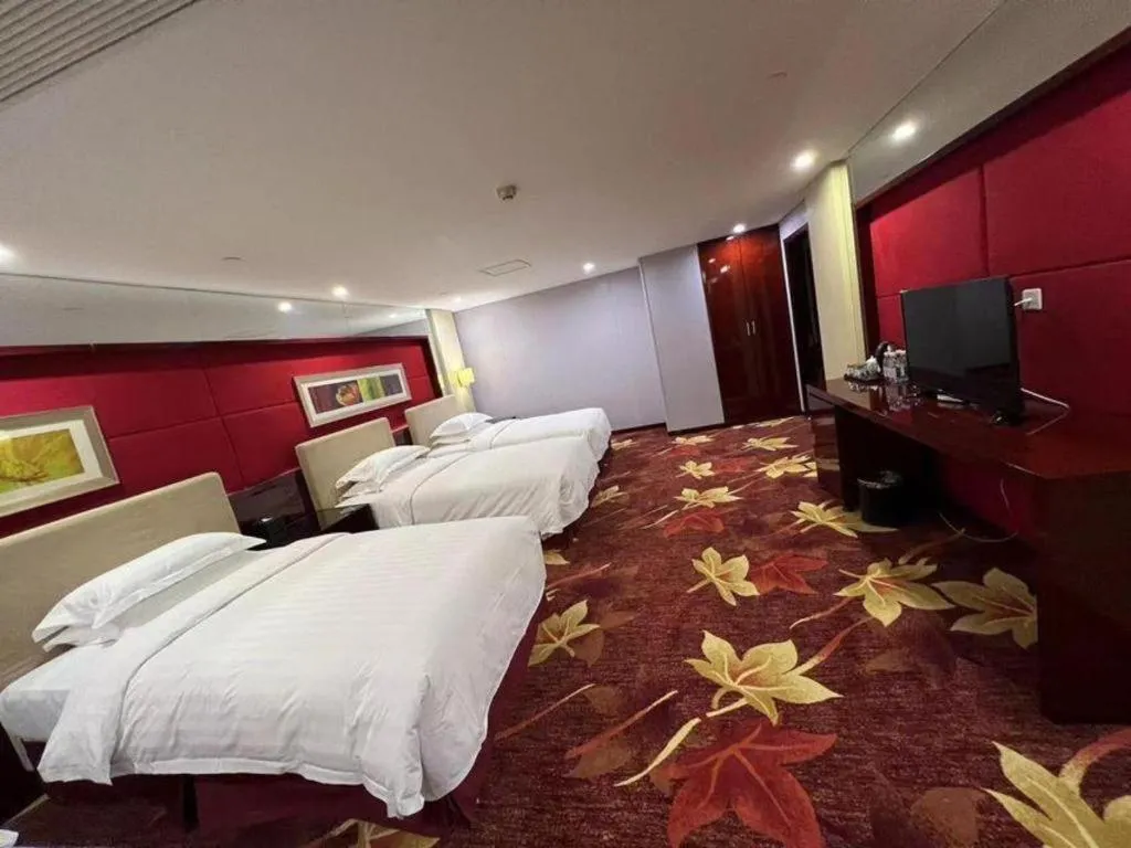 Bed in West International Trade Grand Hotel