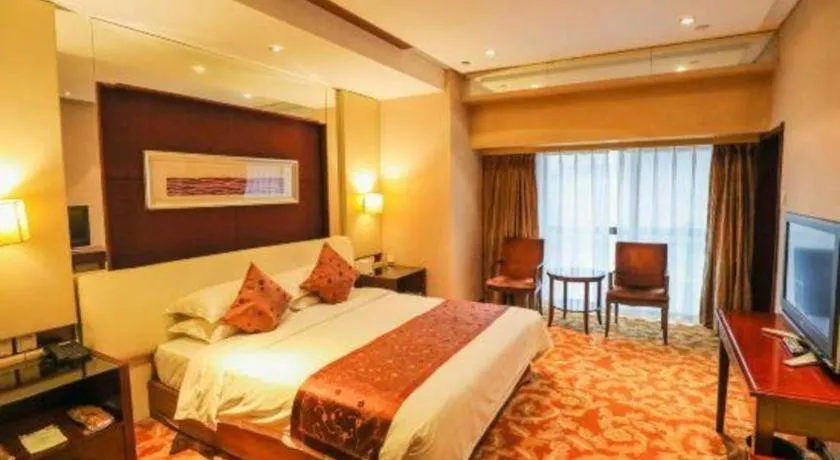 Bed in West International Trade Grand Hotel