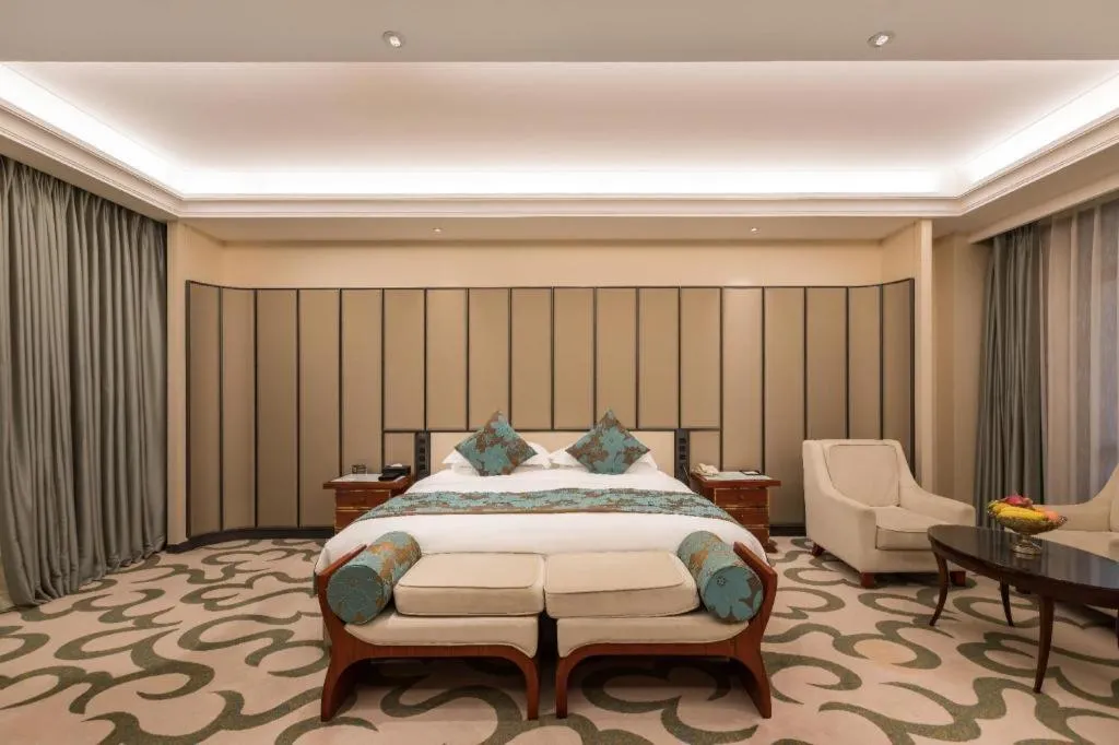 Bed in West International Trade Grand Hotel