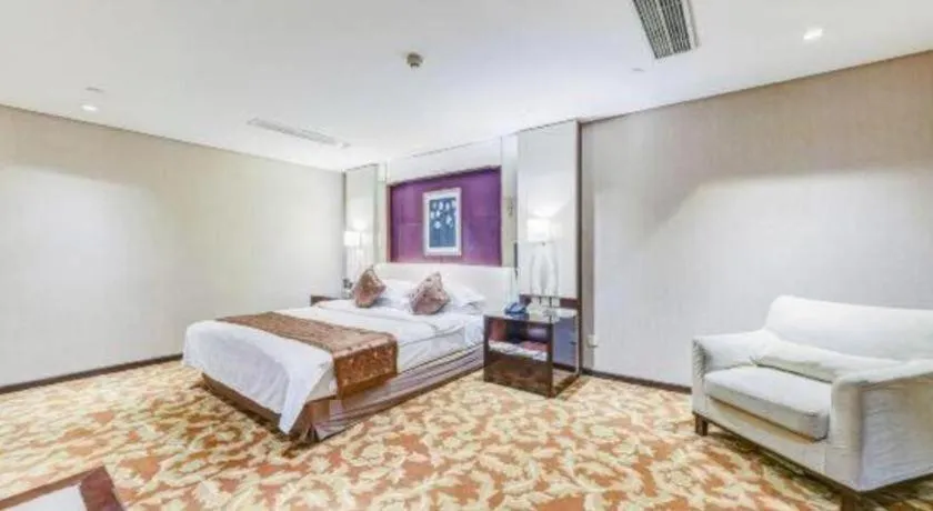 Bed in West International Trade Grand Hotel