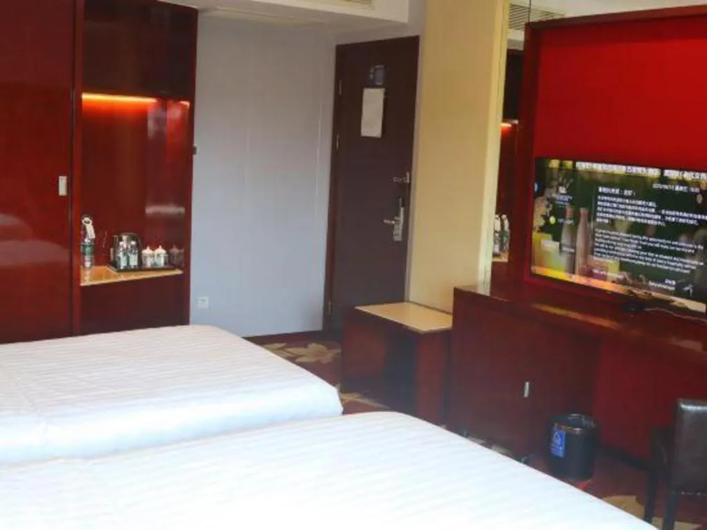 Bed in West International Trade Grand Hotel