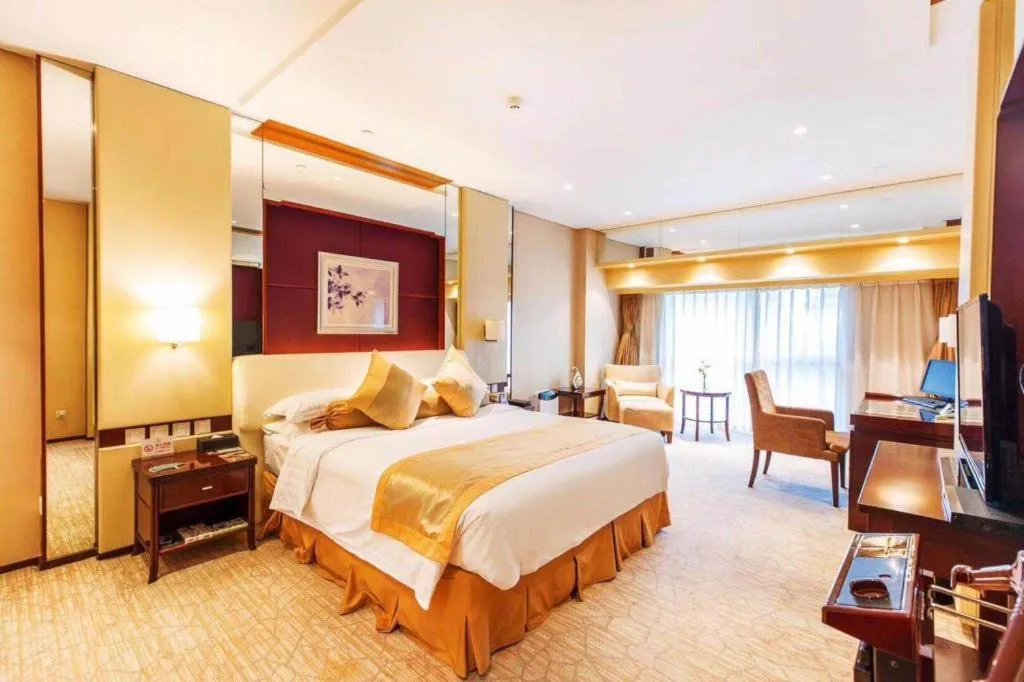 Bed in West International Trade Grand Hotel