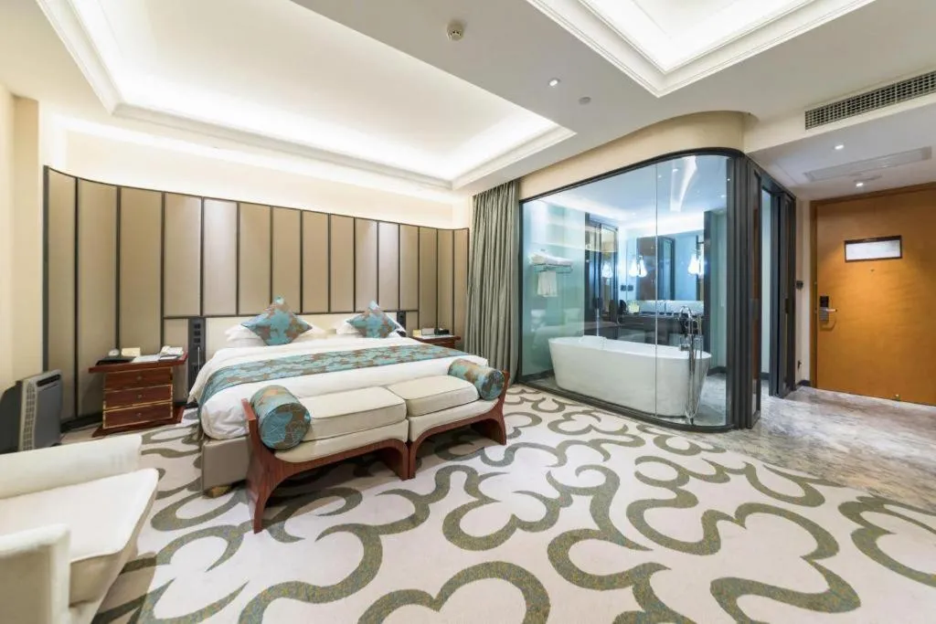 Bed in West International Trade Grand Hotel