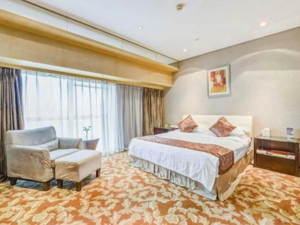 Bed in West International Trade Grand Hotel