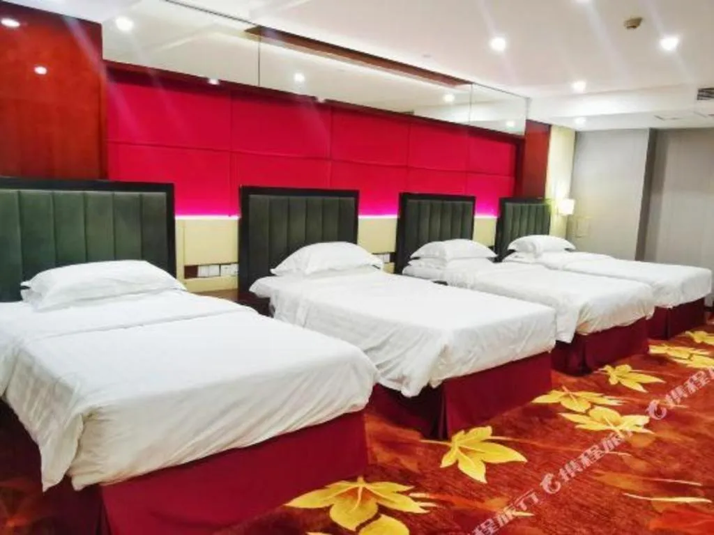 Bed in West International Trade Grand Hotel