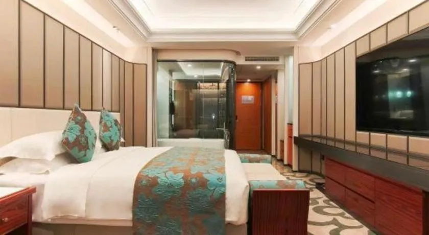 Bed in West International Trade Grand Hotel