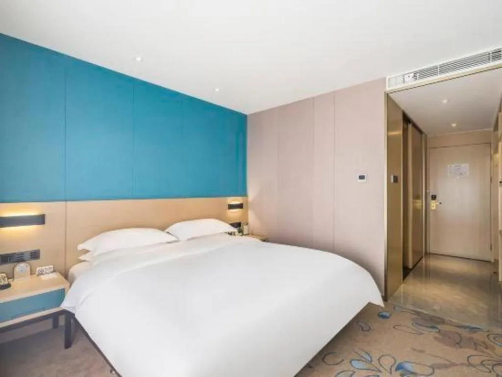 Bed in Beijing Ruyi Business Hotel