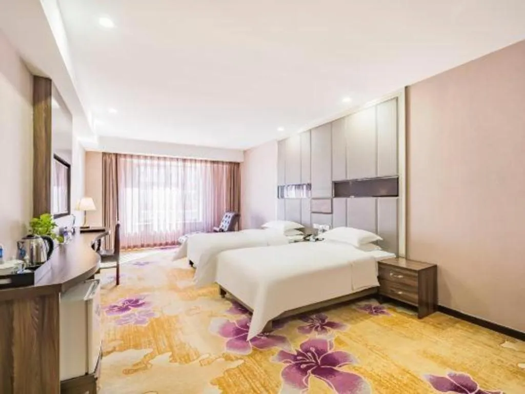 Bed in Beijing Ruyi Business Hotel