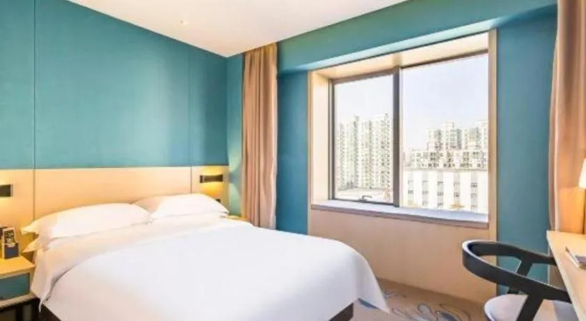 Bed in Beijing Ruyi Business Hotel