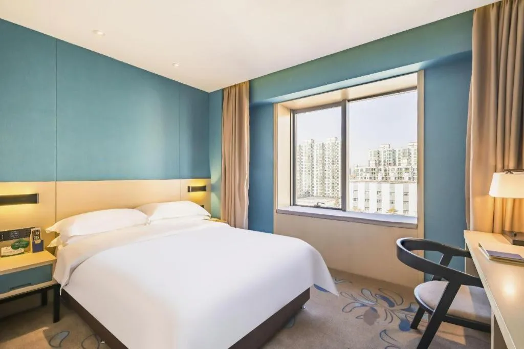 Bed in Beijing Ruyi Business Hotel