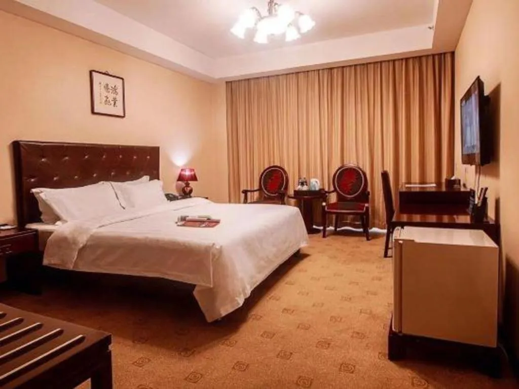 Bed in Beijing Ruyi Business Hotel