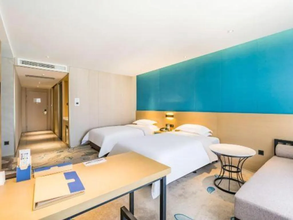 Bed in Beijing Ruyi Business Hotel