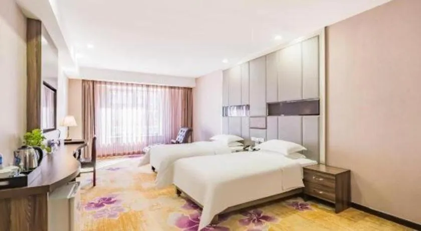 Bed in Beijing Ruyi Business Hotel