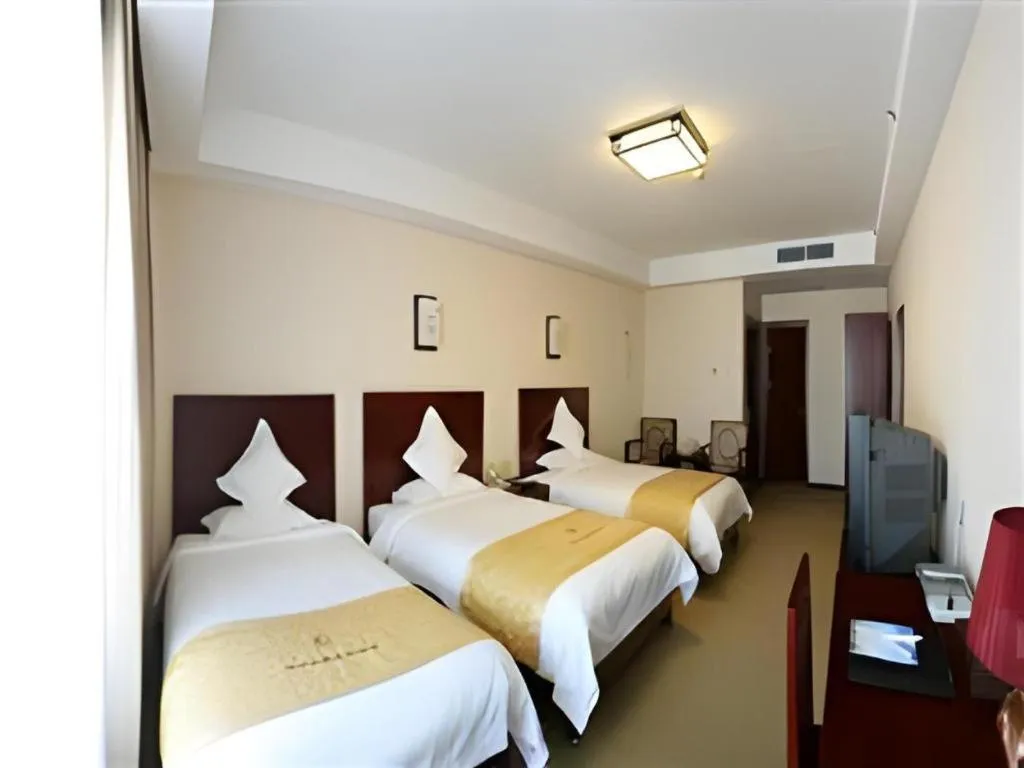 Bed in Beijing Ruyi Business Hotel