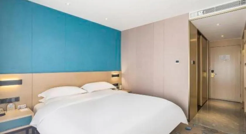 Bed in Beijing Ruyi Business Hotel