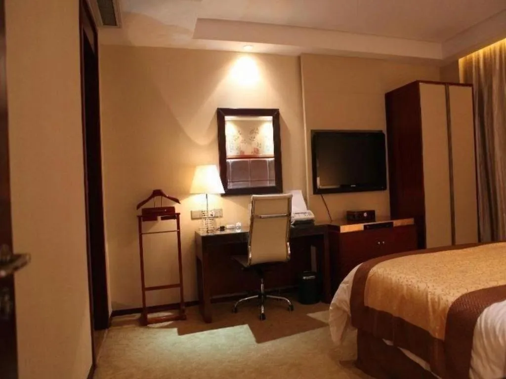 Bed in Yangzhou Hentique Huijin Resort Hotel