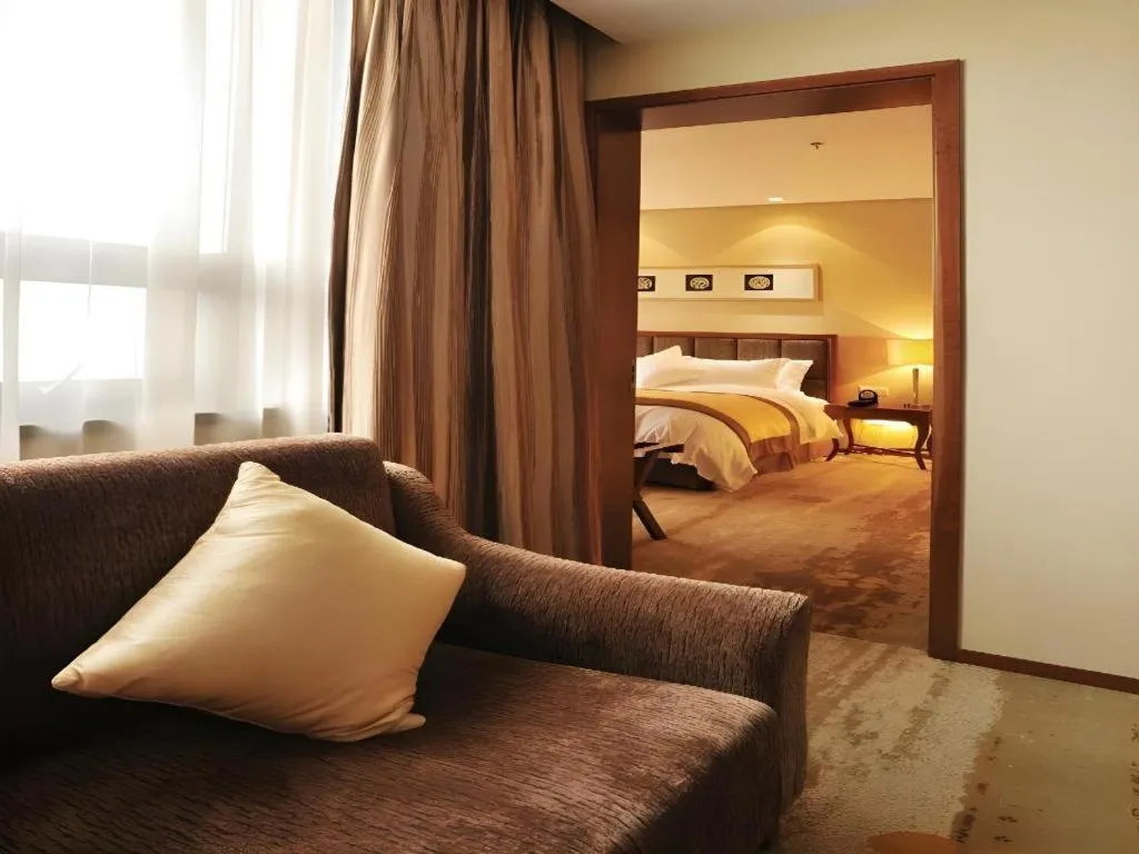 Bed in Yangzhou Hentique Huijin Resort Hotel