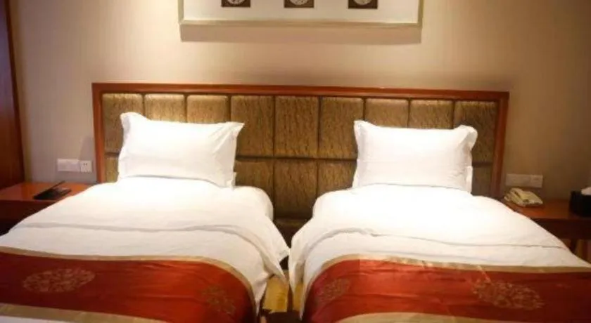 Bed in Yangzhou Hentique Huijin Resort Hotel