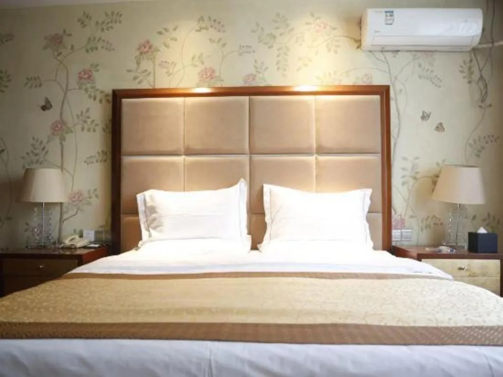 Bed in Yangzhou Hentique Huijin Resort Hotel