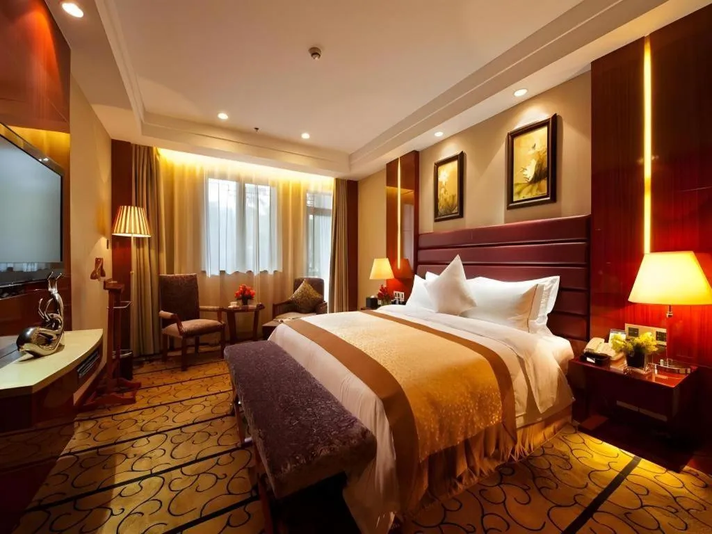 Bed in Yangzhou Hentique Huijin Resort Hotel