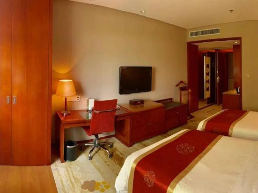 Bed in Yangzhou Hentique Huijin Resort Hotel