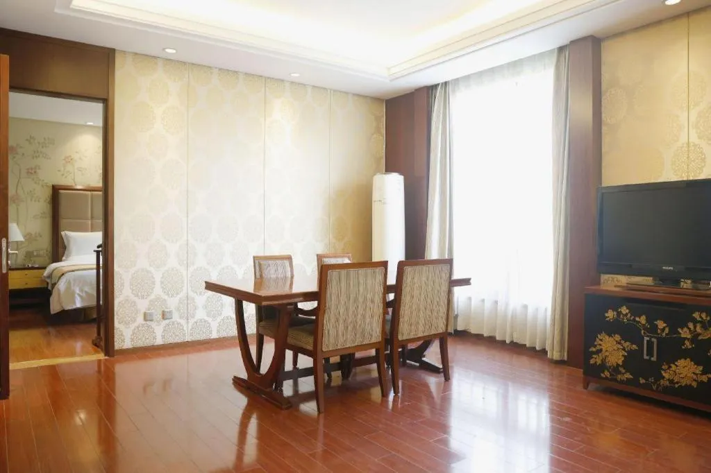 Bed in Yangzhou Hentique Huijin Resort Hotel