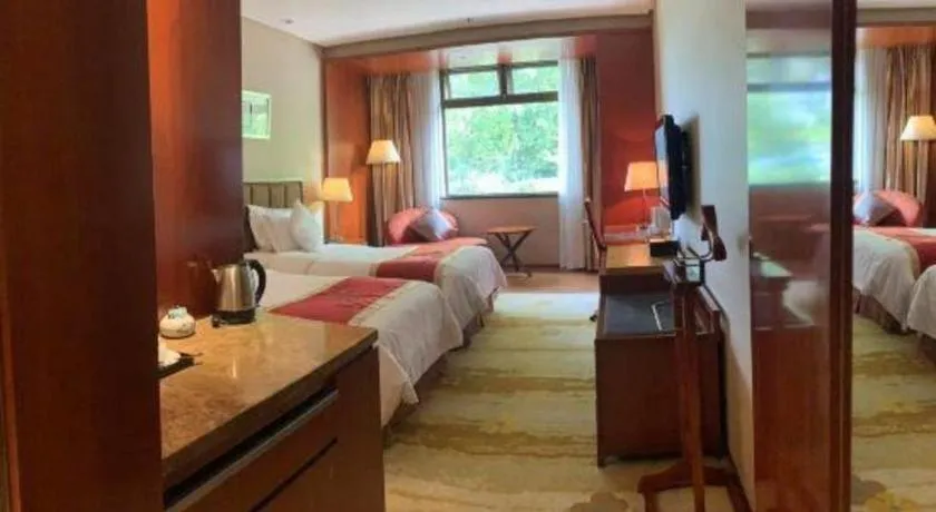 Bed in Yangzhou Hentique Huijin Resort Hotel