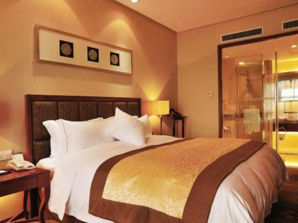 Bed in Yangzhou Hentique Huijin Resort Hotel