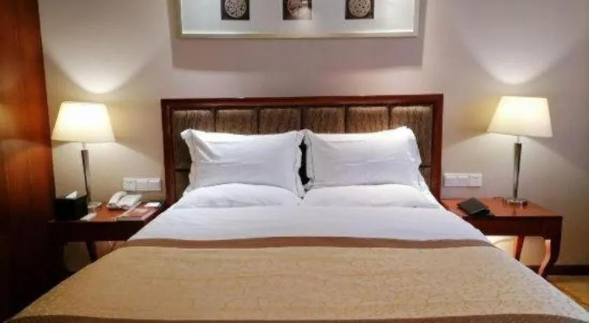 Bed in Yangzhou Hentique Huijin Resort Hotel