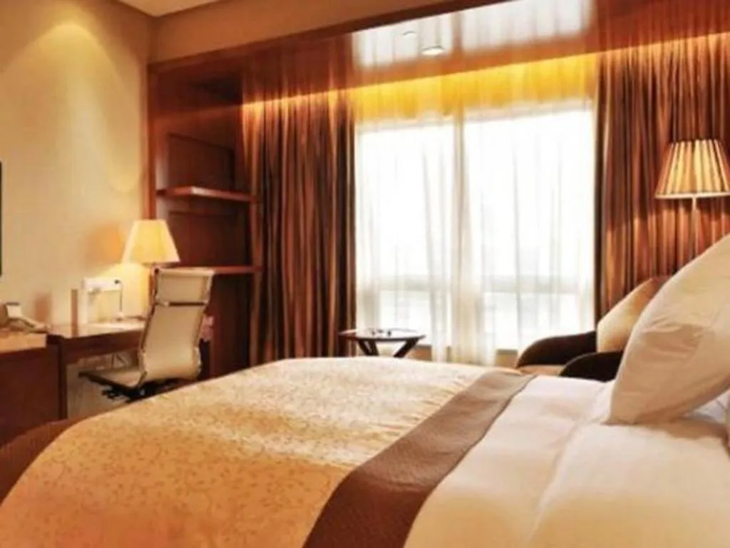 Bed in Yangzhou Hentique Huijin Resort Hotel