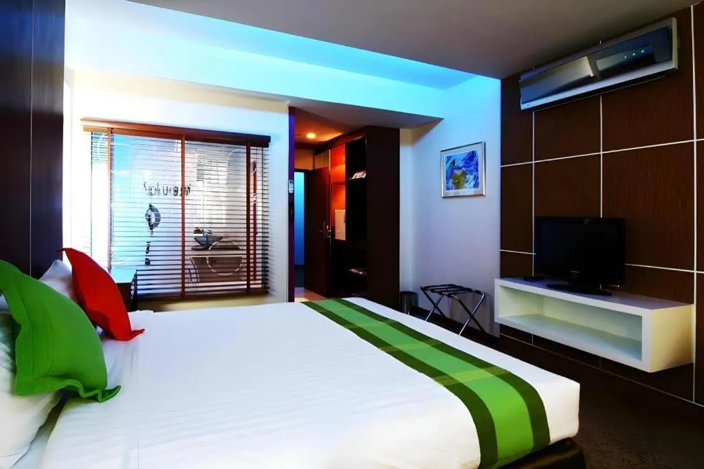 Bed in V-One Hotel Korat