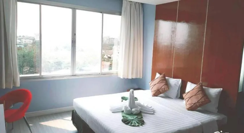 Bed in V-One Hotel Korat