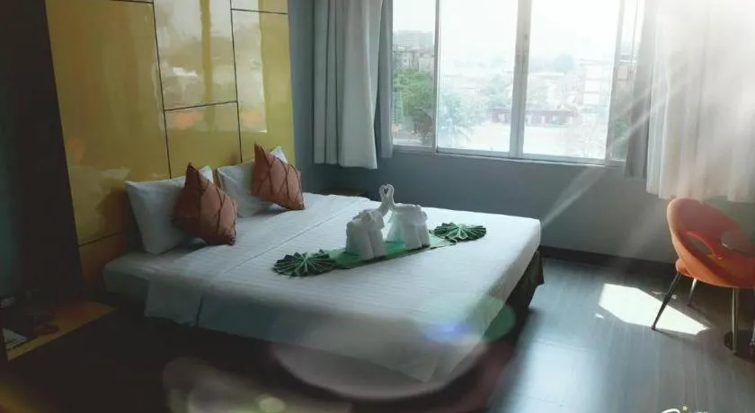 Bed in V-One Hotel Korat