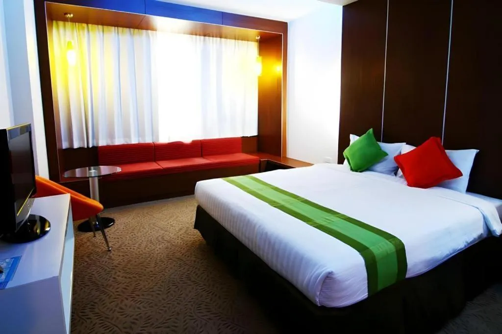 Bed in V-One Hotel Korat