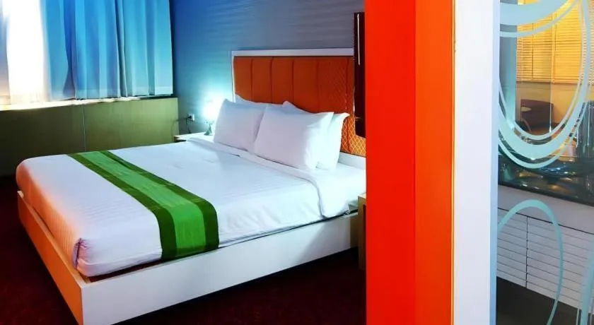Bed in V-One Hotel Korat