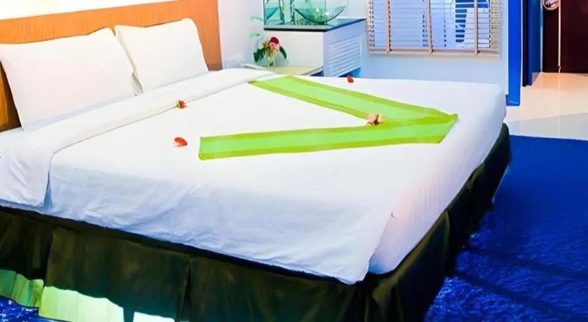 Bed in V-One Hotel Korat