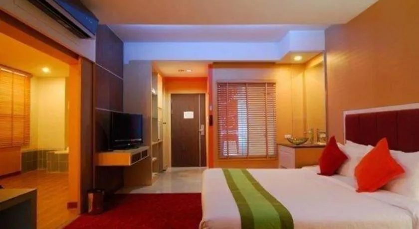Bed in V-One Hotel Korat