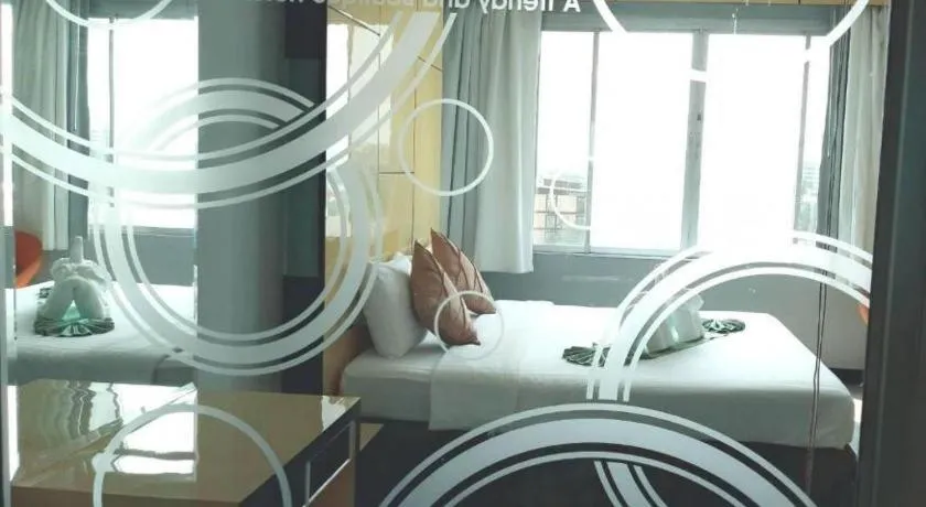 Bed in V-One Hotel Korat