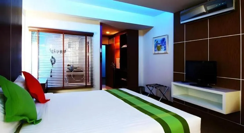 Bed in V-One Hotel Korat