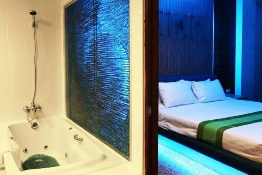 Bed in V-One Hotel Korat