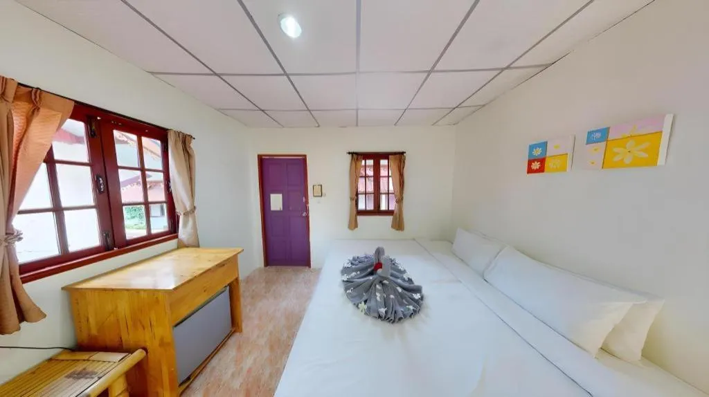 Bed in Phangan Cabana Resort