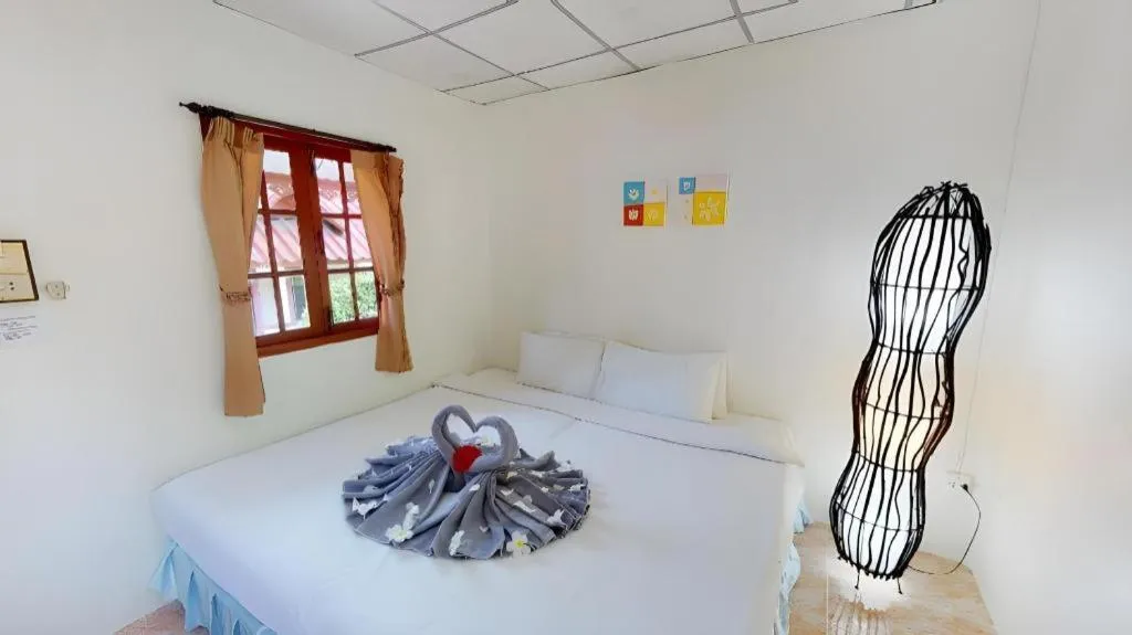 Bed in Phangan Cabana Resort