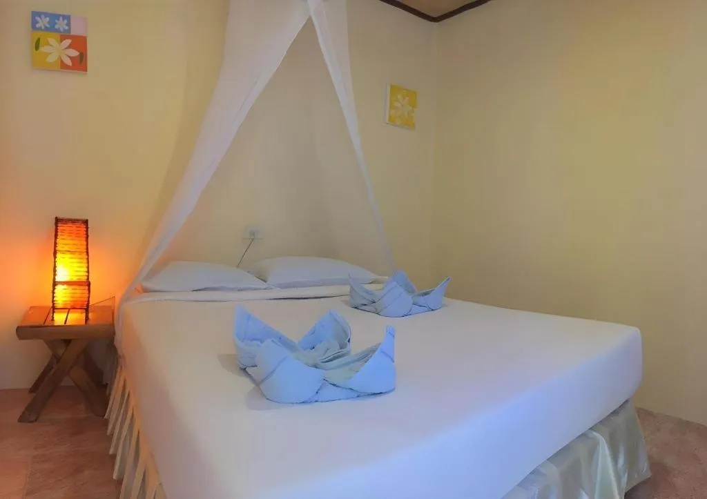 Bed in Phangan Cabana Resort