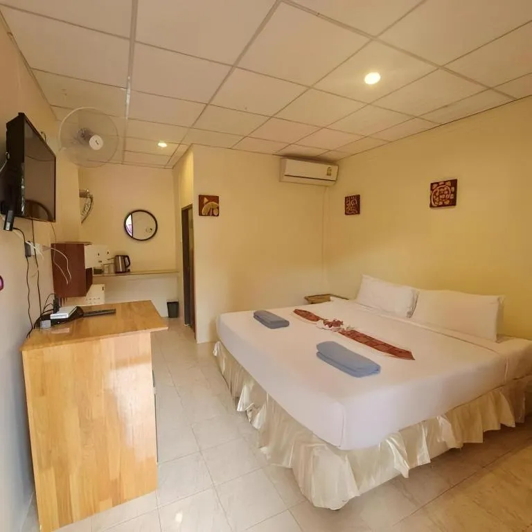 Bed in Phangan Cabana Resort