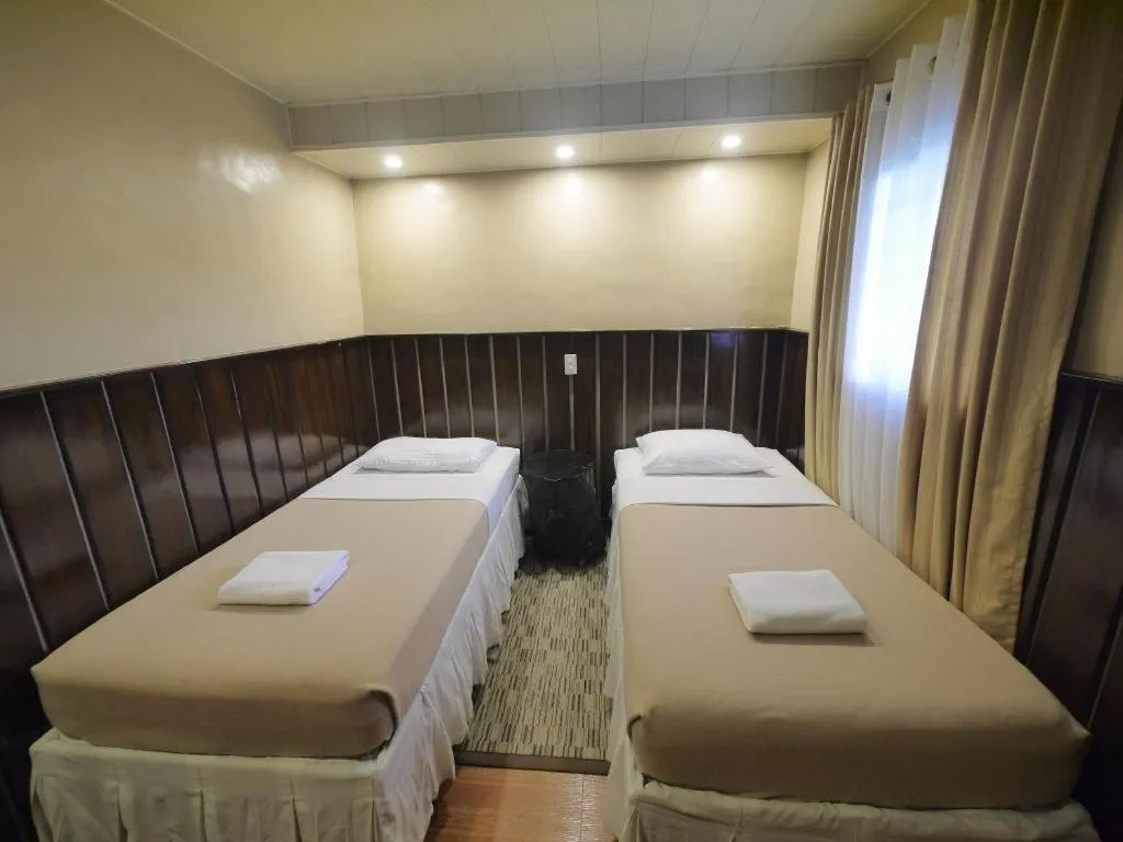 Bed in Mountain Lodge Hotel and Restaurant