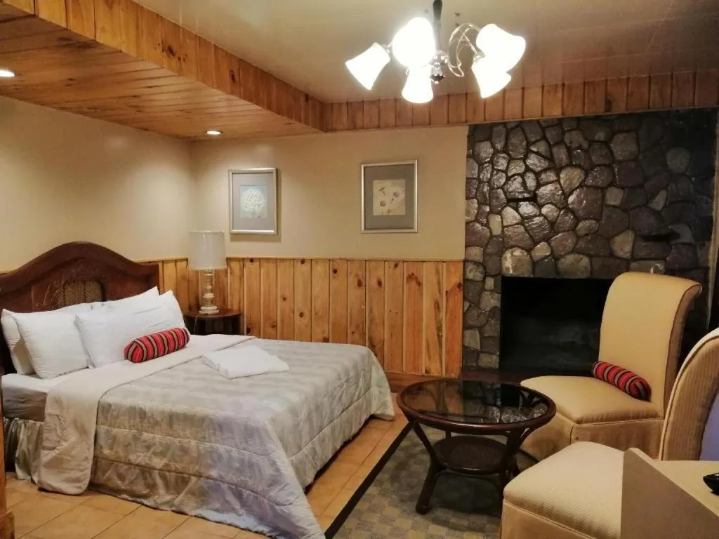 Bed in Mountain Lodge Hotel and Restaurant