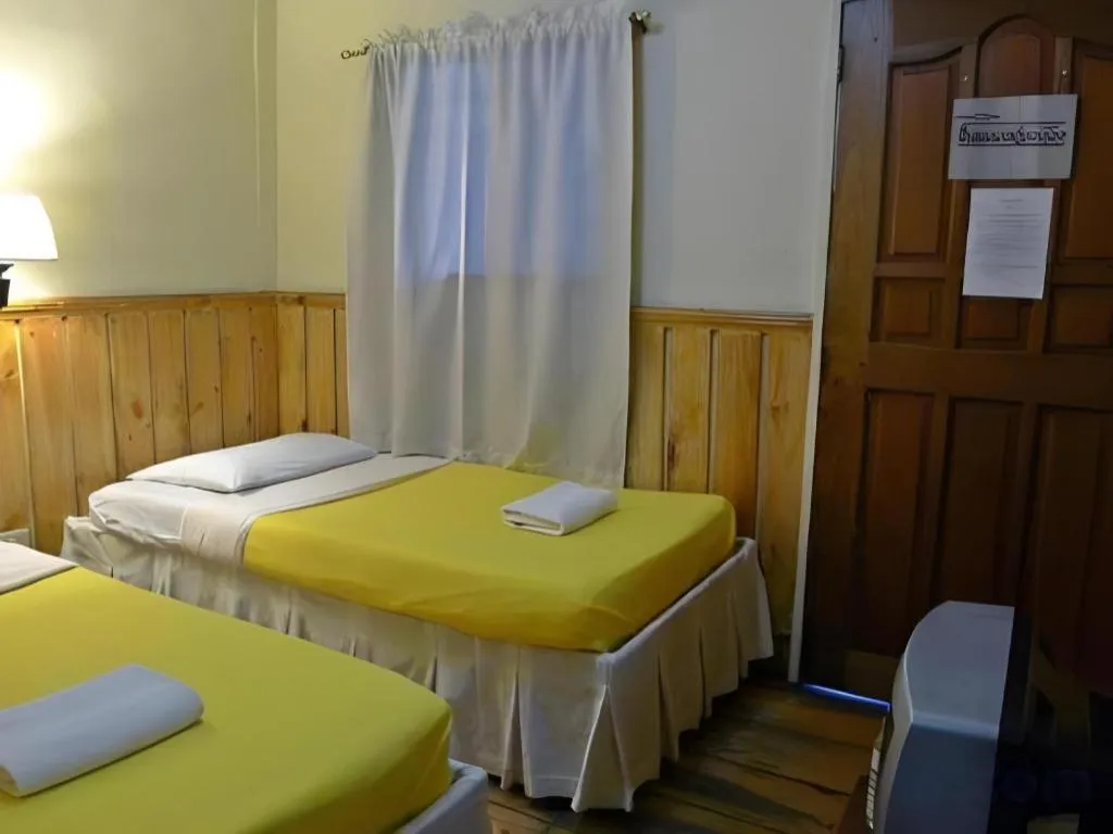 Bed in Mountain Lodge Hotel and Restaurant